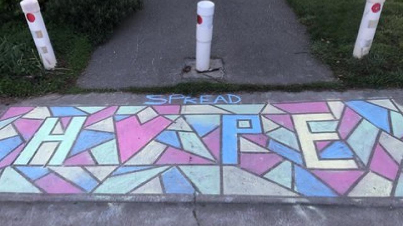 spread hope written in chalk