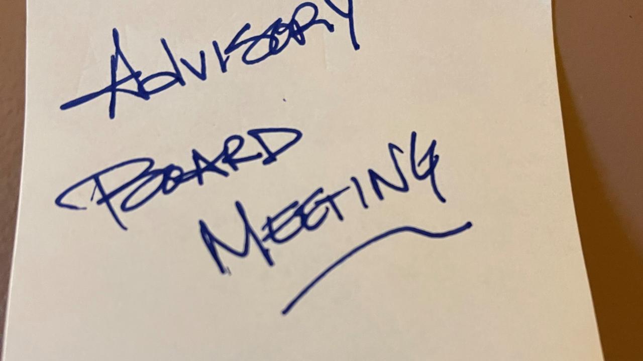Note in blue ink advisory board meeting