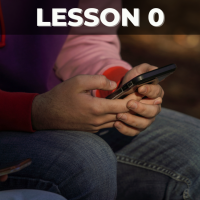 Person holding phone, titled Lesson 0