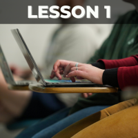 Student typing on laptop